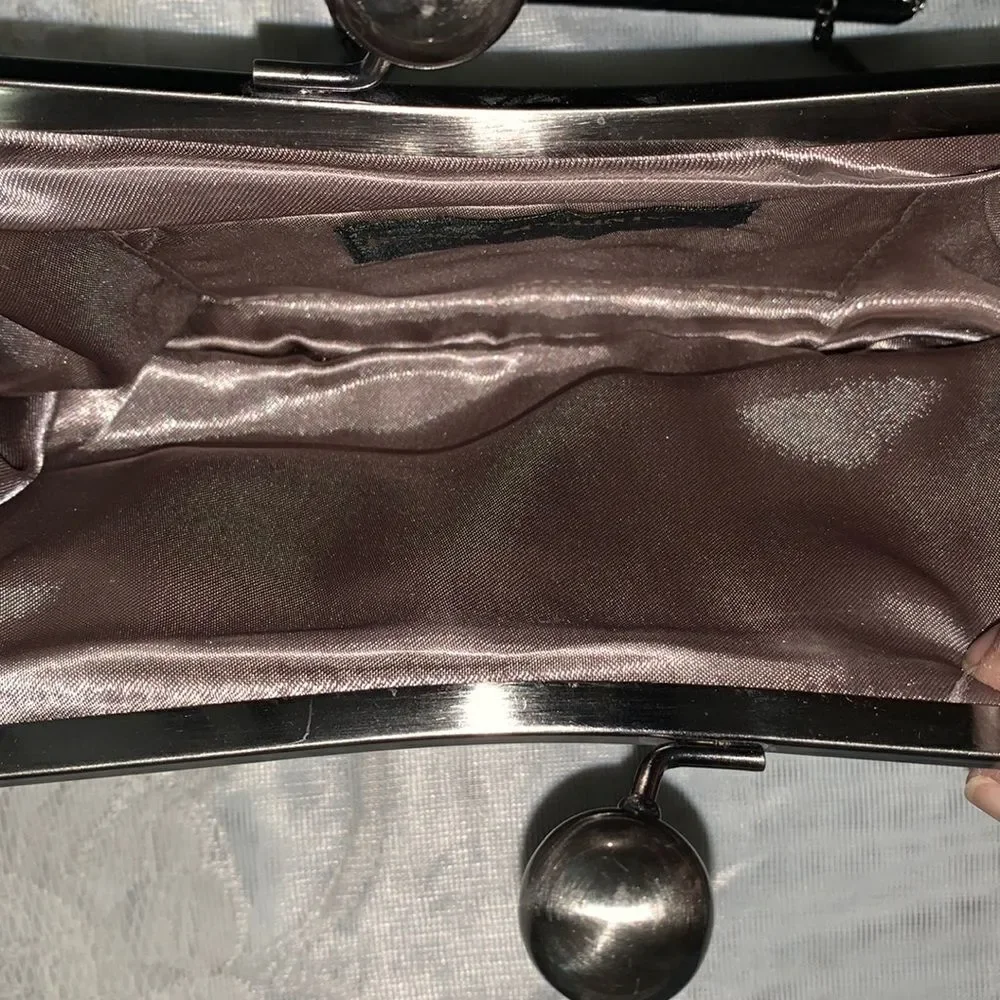 Jessica McClintock faux Leather kiss lock clutch in bronze